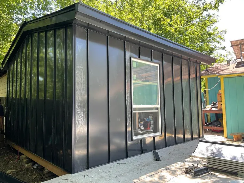 Black standing seam metal wall panels for Roof Inspection in St. Augustine Shores